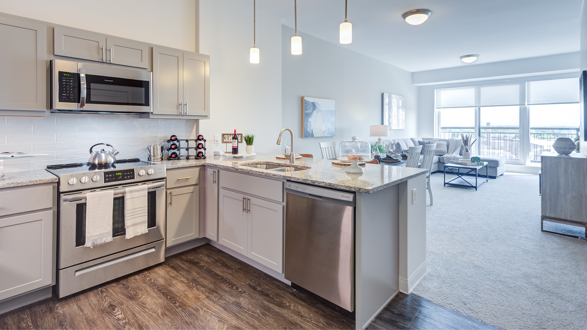 a man and woman smiling and holding a cup of coffee